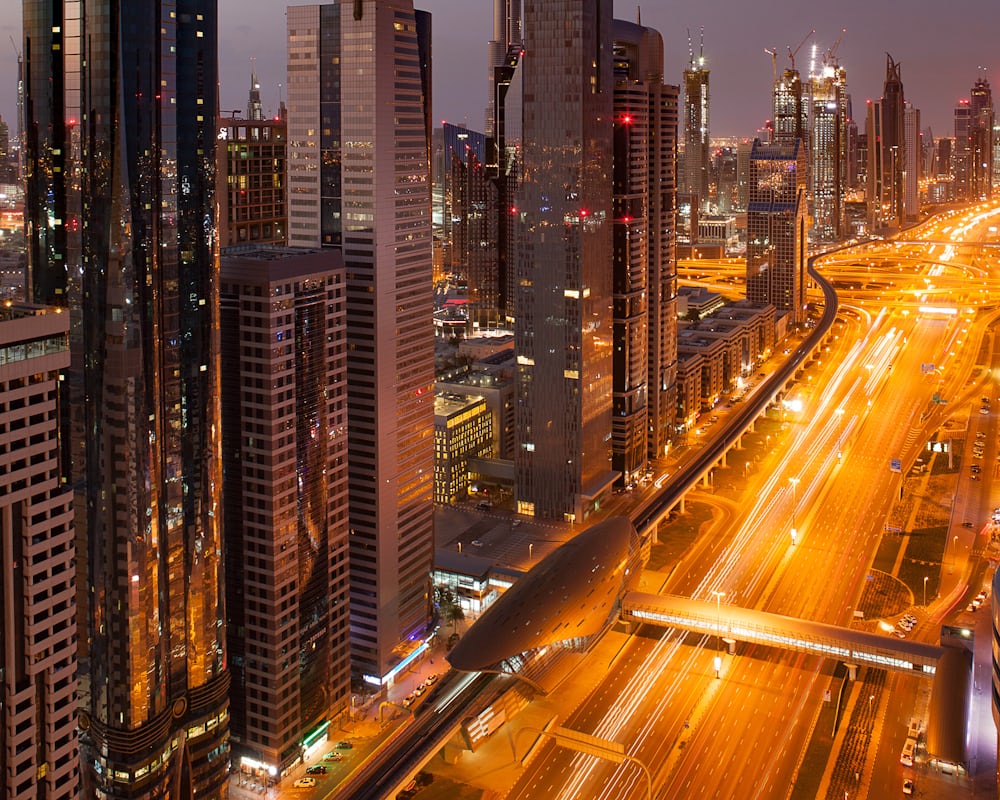 Modern office towers of Dubai's central business district (DWTC area) at dusk